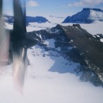 Ice 06 – Antarctica – Reviewing Ice Fields for Landing Sites against Sat Imagery amongst Mountains in Northern Victoria Land, from a C-130.